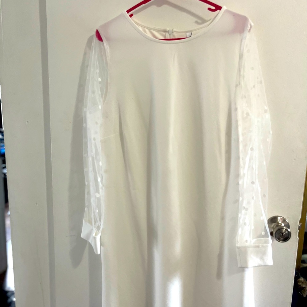 White dress with lace polka dot sleeves